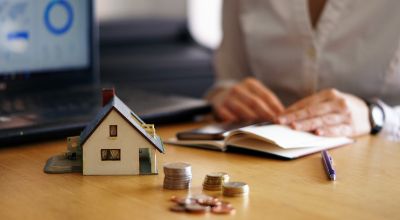closeup-shot-person-thinking-buying-selling-house
