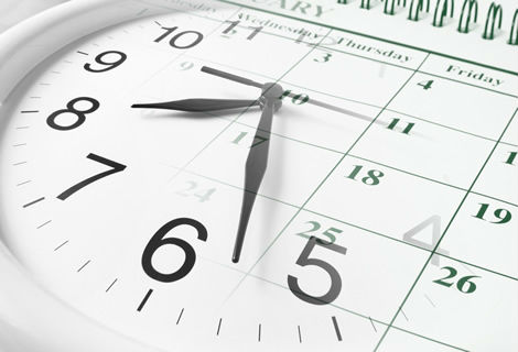 Immagine di un ororlogio e di un calendario